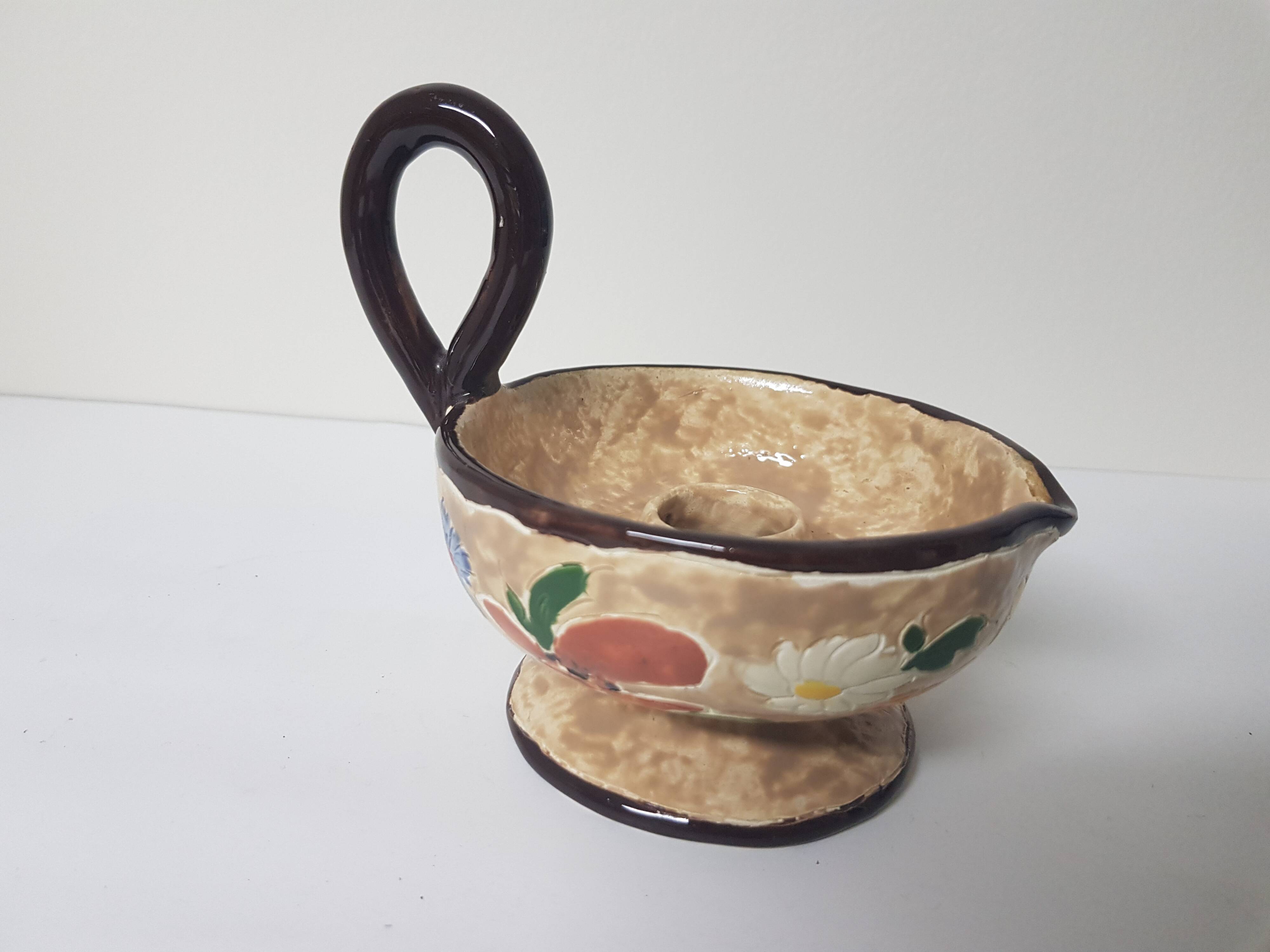 Floral motif ceramic candle holder signed J Massier Vallauris