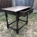 Vintage desk table in solid oak with 1 drawer facing turned legs with sleepers.
