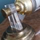 Golden metal appliques and plexiglass perspex in the style of Maison Lunel or Guariche.
