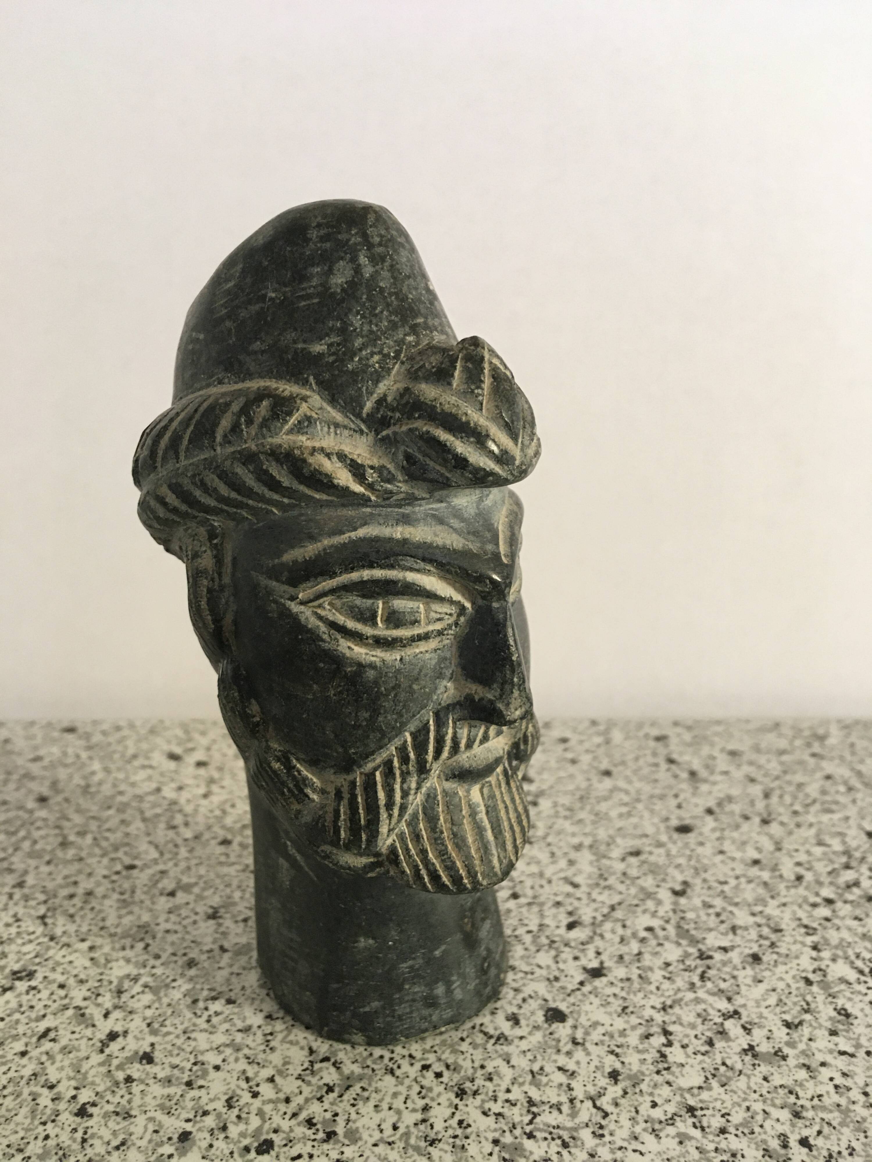 Black marble bust sculpture