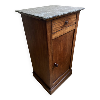 Vintage bedside table in the shape of a wooden column and a gray marble top