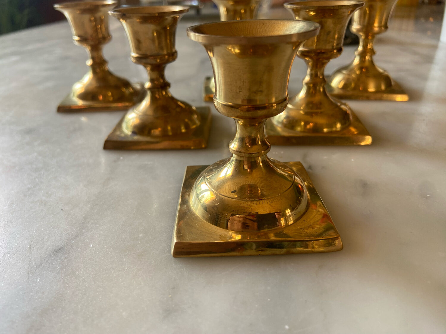 Series of 6 vintage brass candle holders