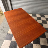 Extendable teak table