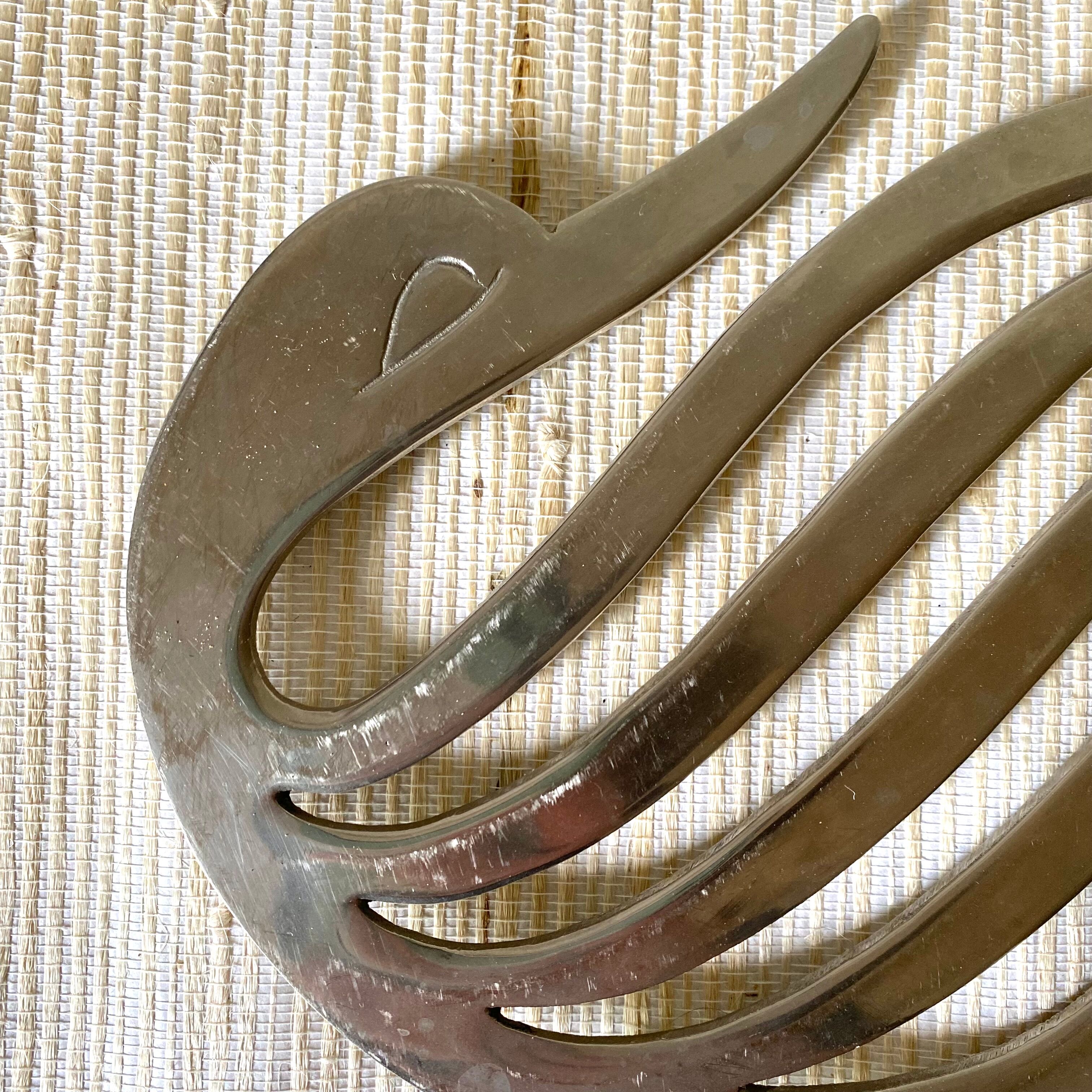 Silver metal triflies