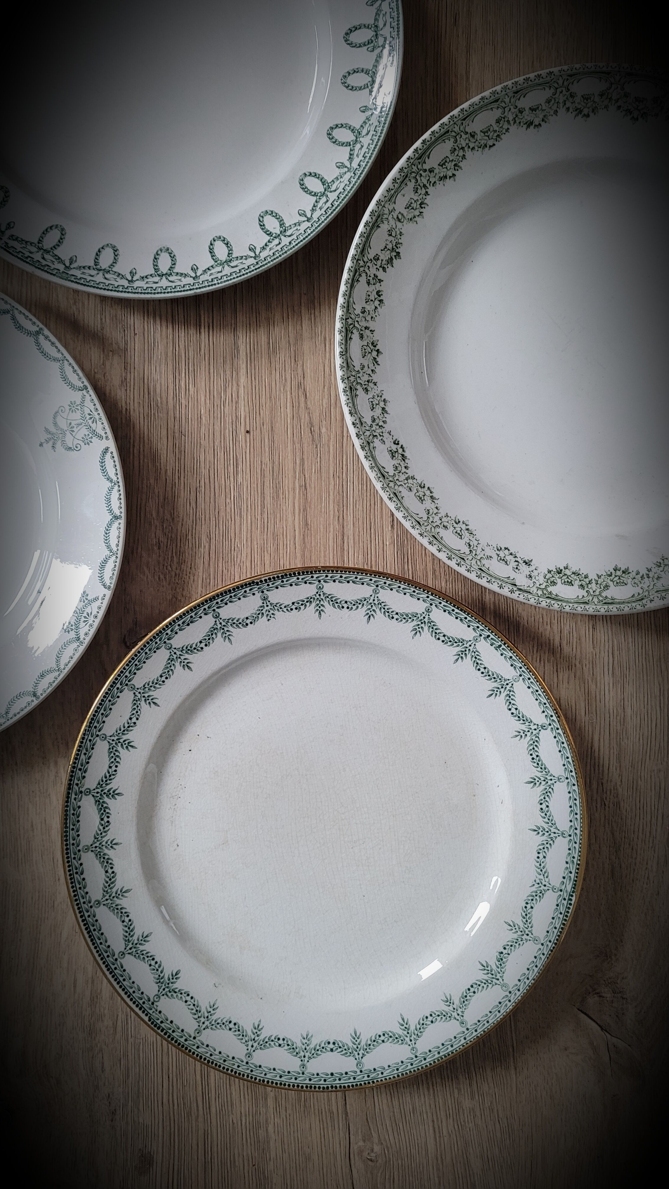 Set 4 green mismatched plates