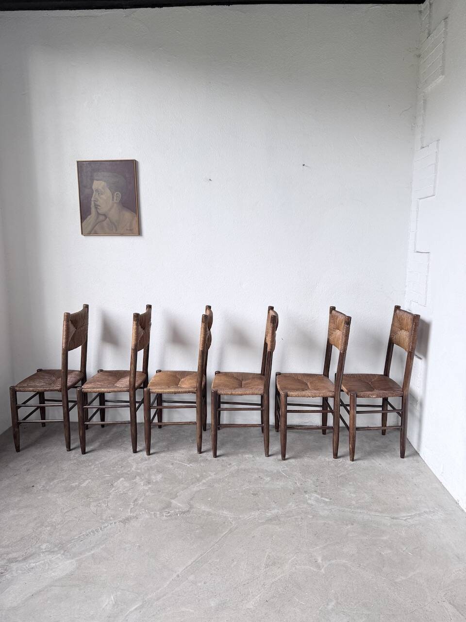 Set of 6 straw and oak Beauche chairs.