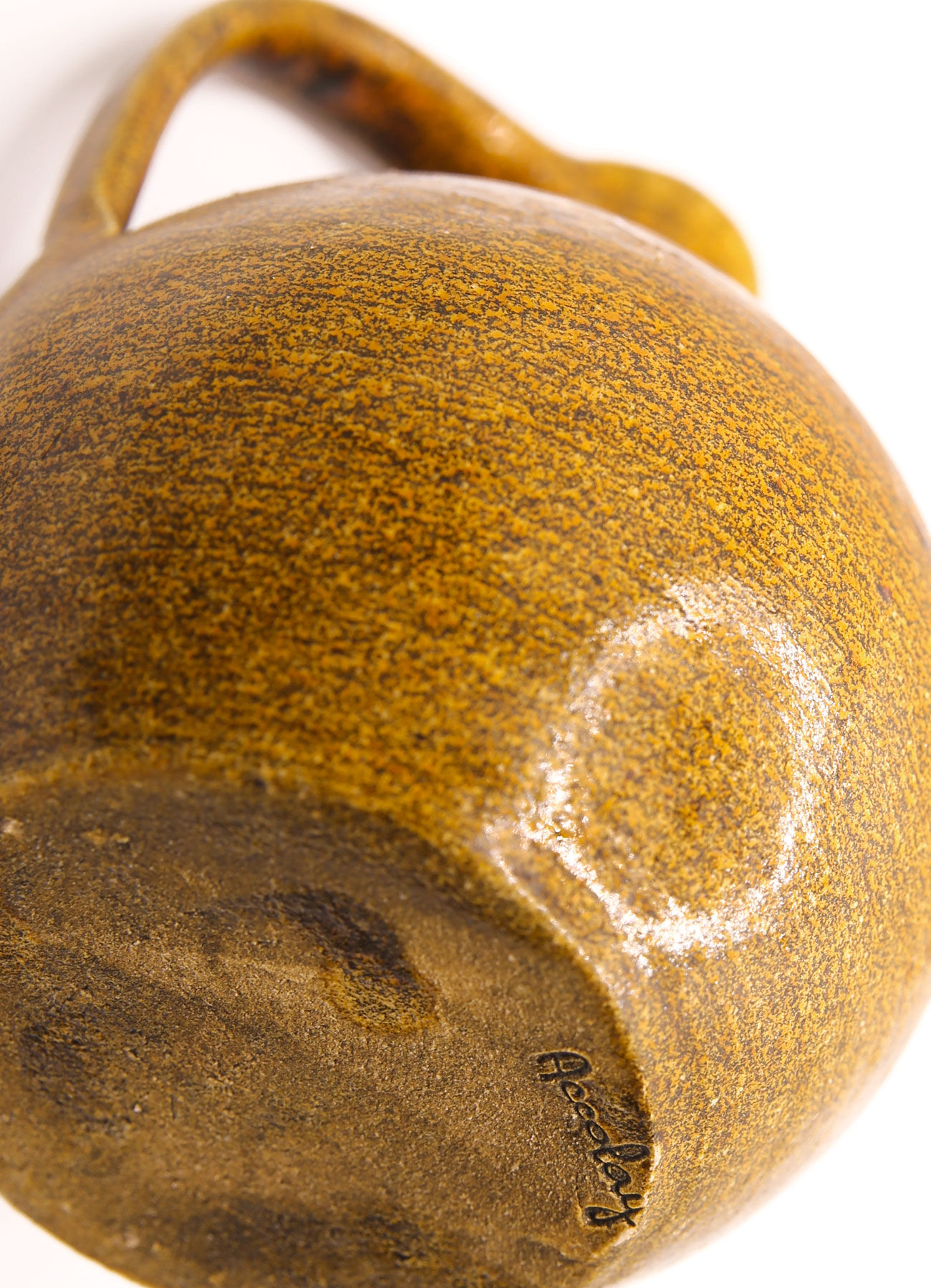 Brown pitcher and saffron yellow with naïve flowers of Accolay