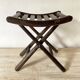 Folding slatted wooden stool