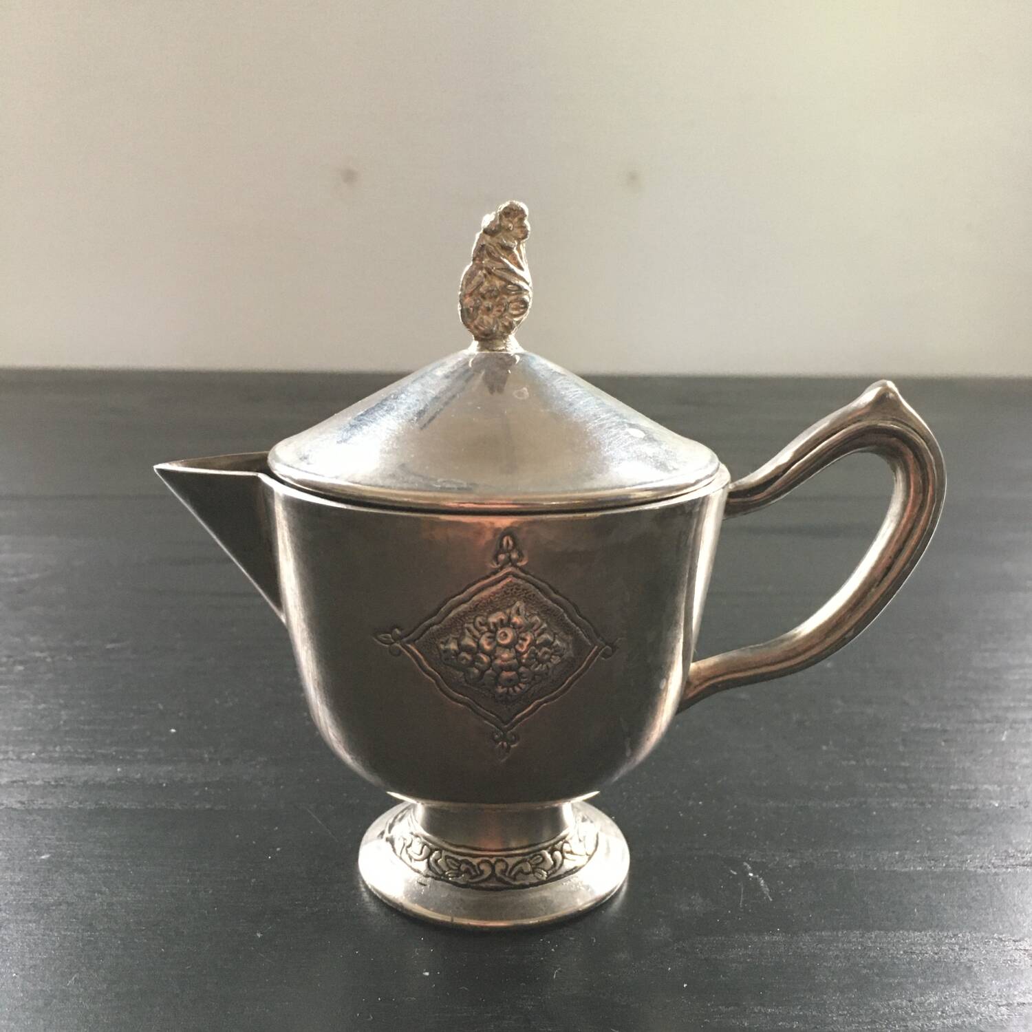 Classic silver metal creamer