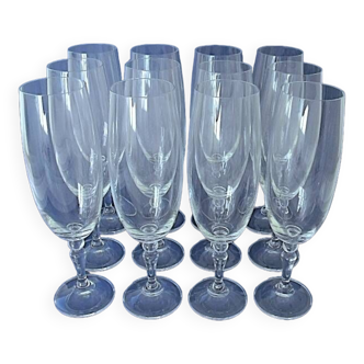Suite of twelve (12) champagne flutes in colorless crystal