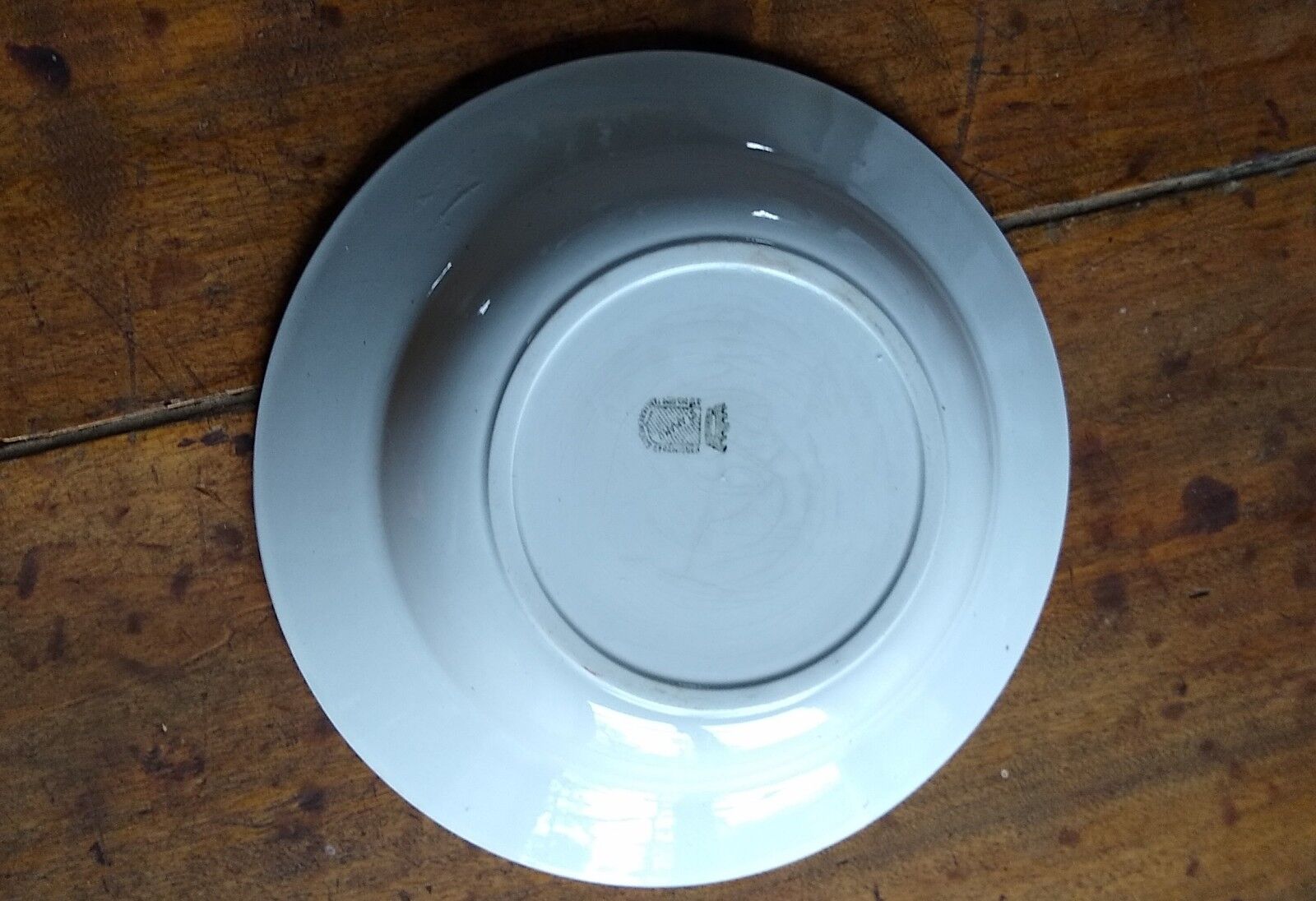 Round dish in Earthenware St Amand decorated with fruit apples and plums