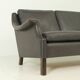 Aage Christiansen three-seater sofa in dark brown leather, 1960s