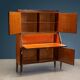 Vintage drop-leaf secretary desk in exotic wood and brass, 1950s.