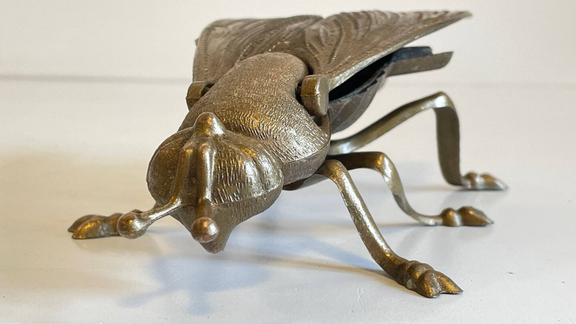 Vintage fly ashtray in patinated metal