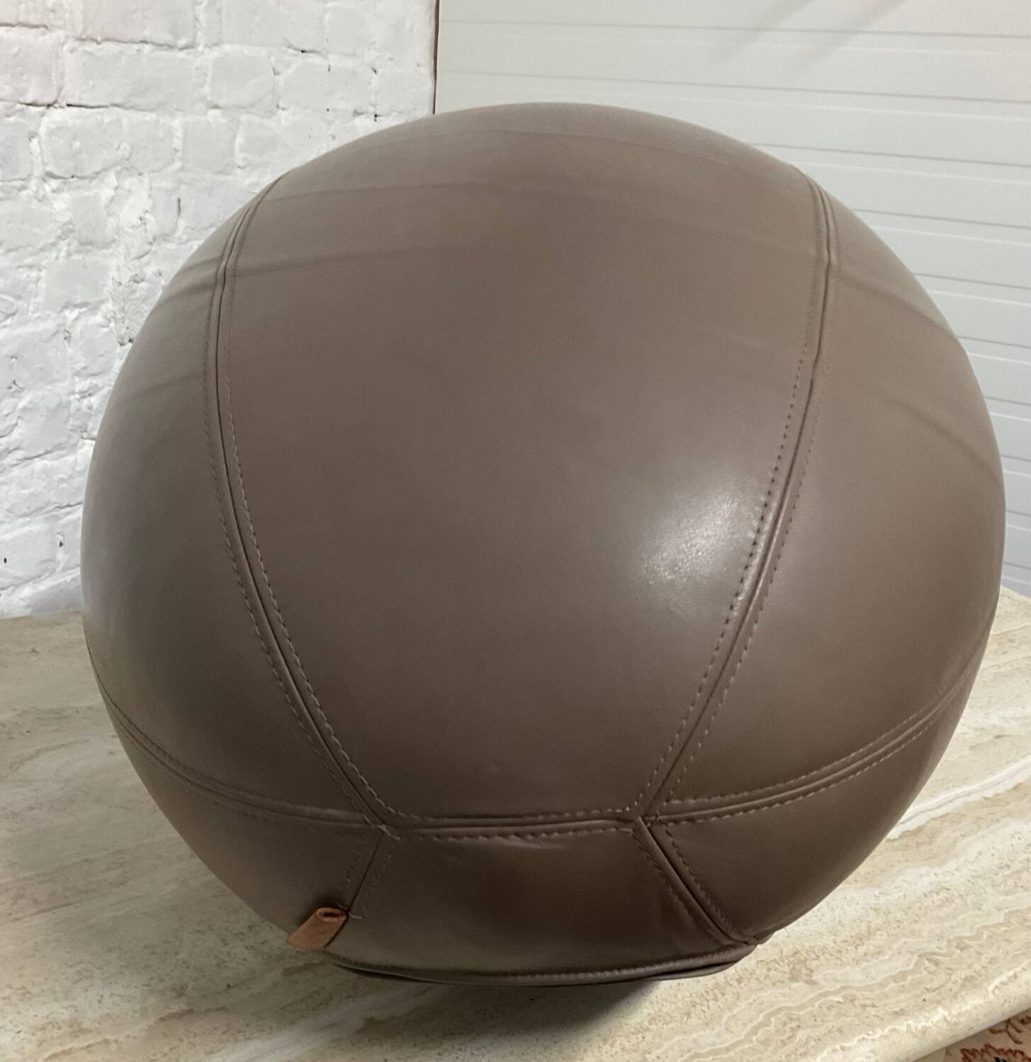 Pouf design by Antonio Pinto for Durlet leather rugby ball