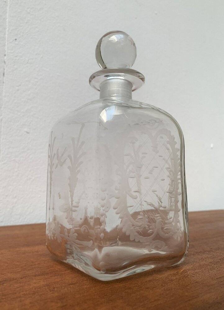 Vintage Danish glass bottle with engraving.