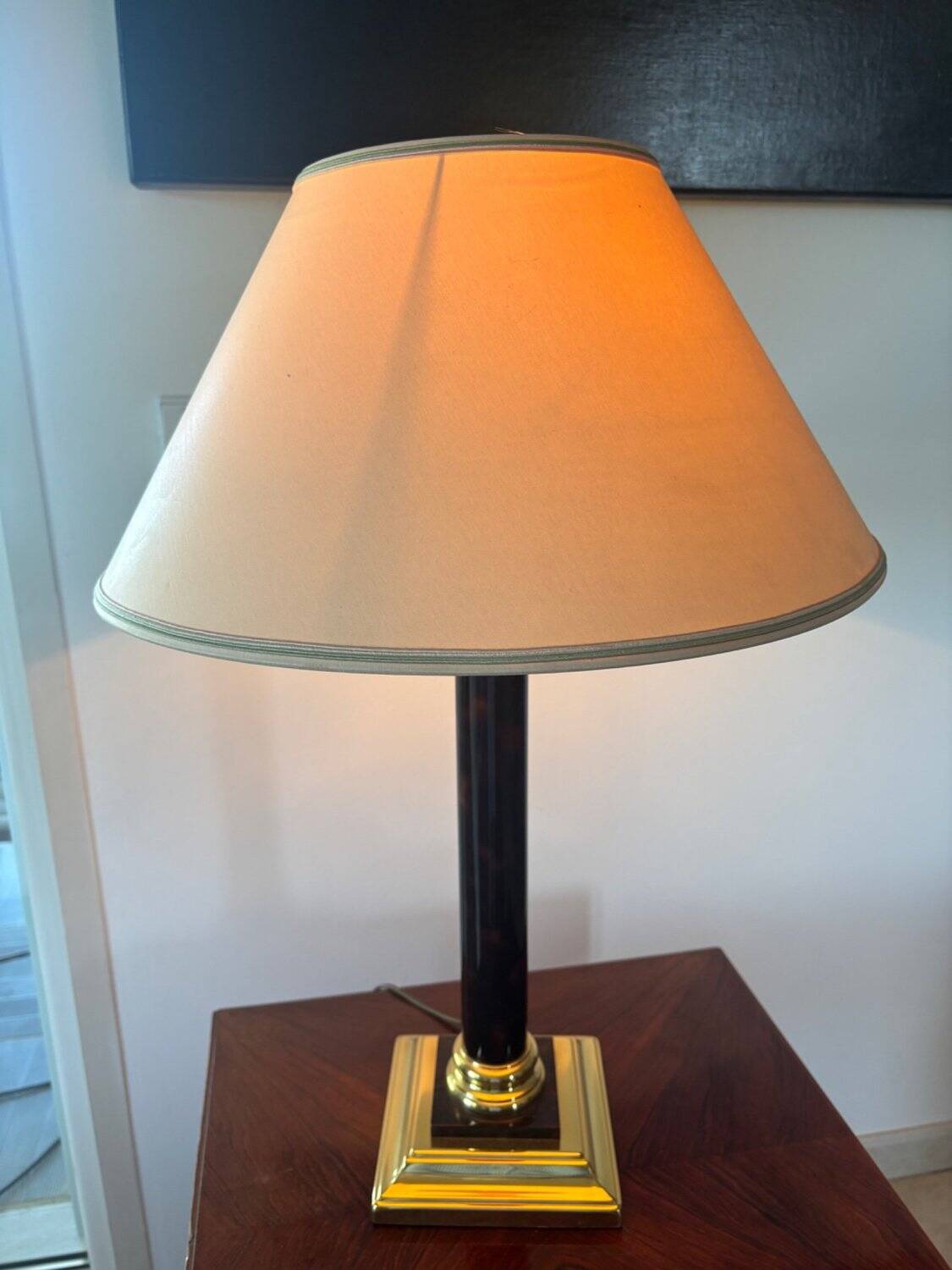 Empire style table lamp, gilded brass and black lacquered.