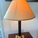 Empire style table lamp, gilded brass and black lacquered.