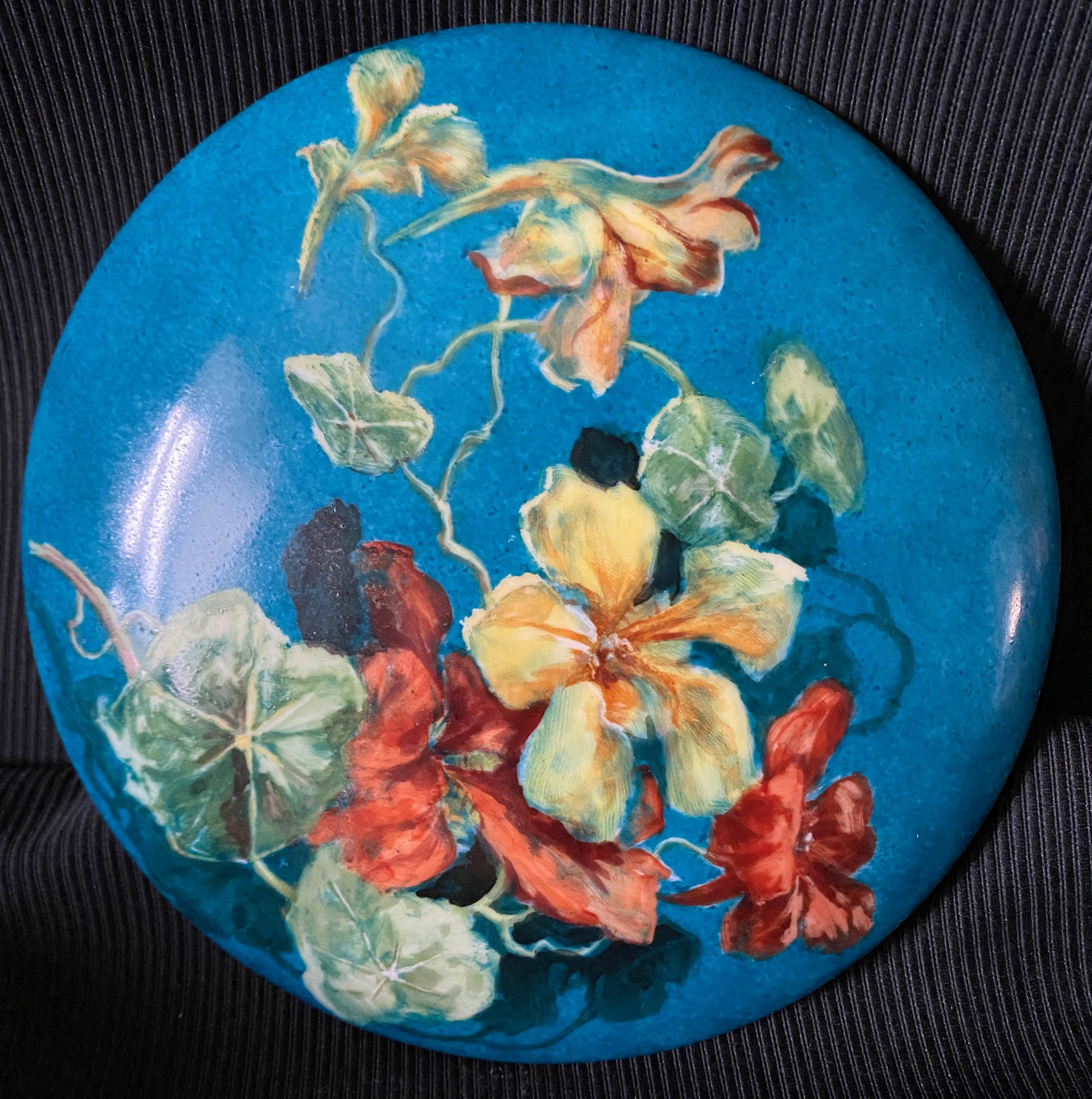 Antique porcelain candy box with floral motifs