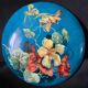 Antique porcelain candy box with floral motifs