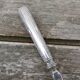 Old sauce spoon