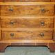 Vintage walnut commode with sliding top in Butler style.