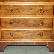 Vintage walnut commode with sliding top in Butler style.
