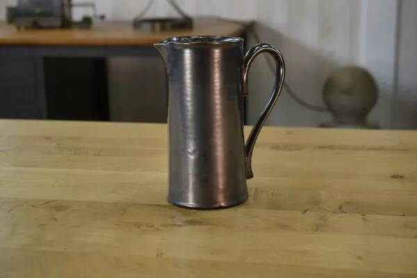 Black ceramic pitcher 1950s