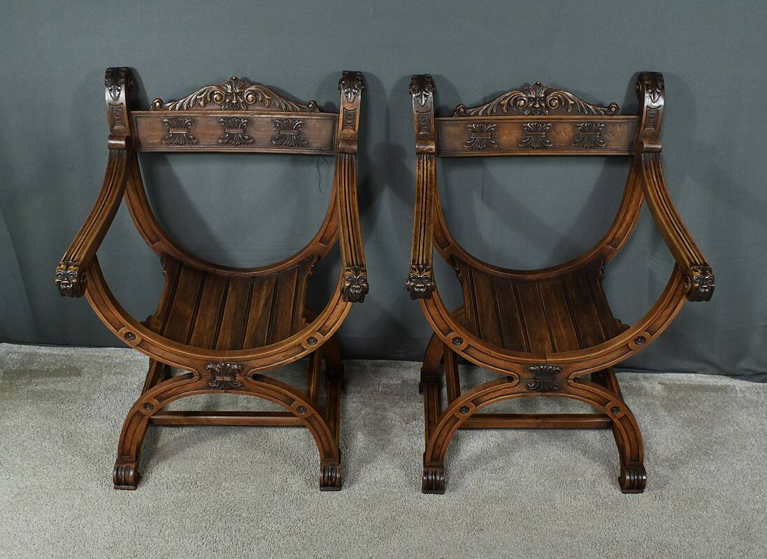 Pair of Dagobert walnut armchairs, medieval style – late 19th century