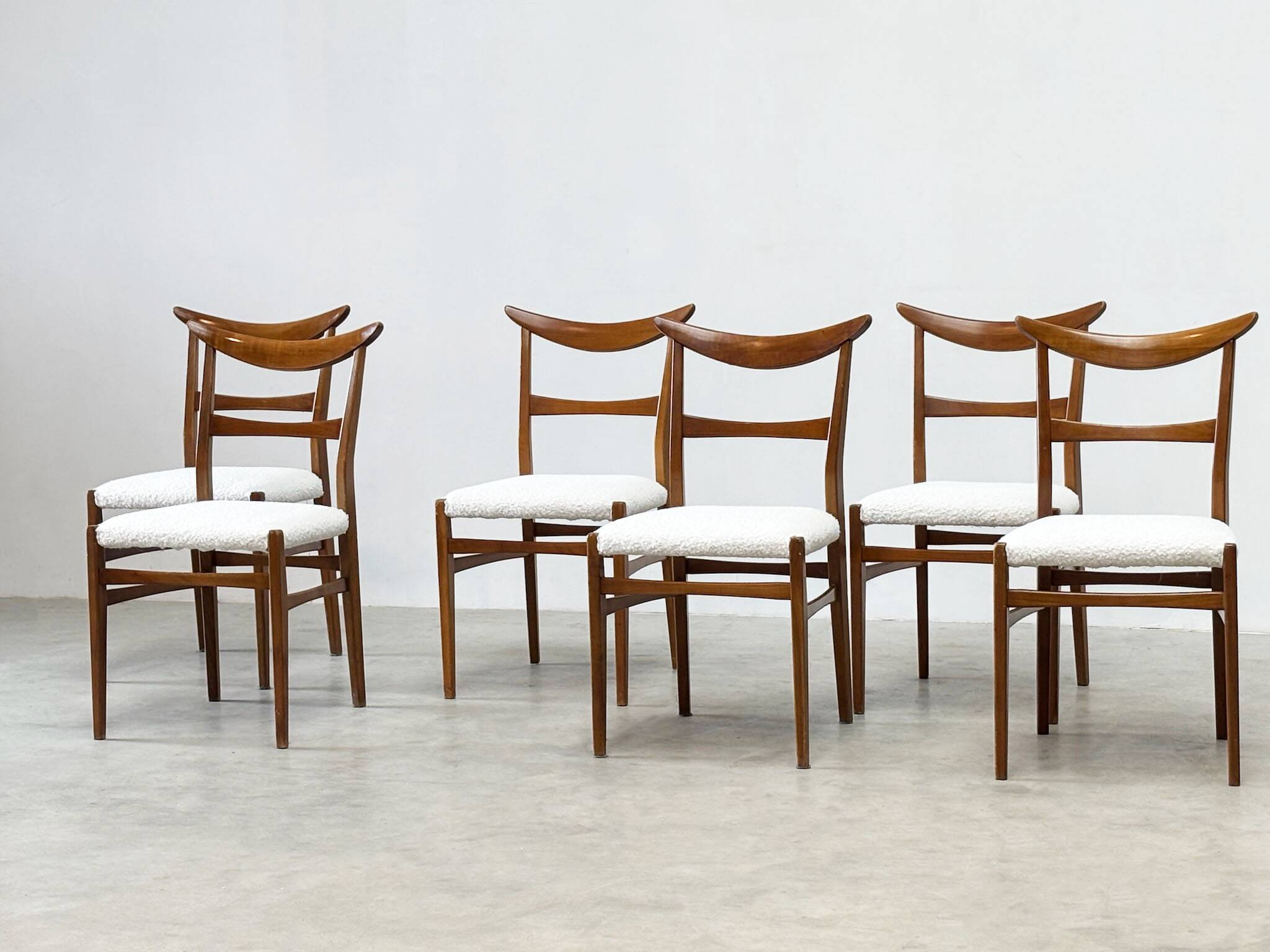 Set of six walnut Lübke dining chairs