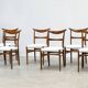 Set of six walnut Lübke dining chairs