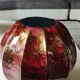 Vase boule godronné, en verre d Art laqué. Décor volutes de fumée tons roses, inclusions poudre d or. Signé Sylvie Montagnon. Dim 20 x 20 cm