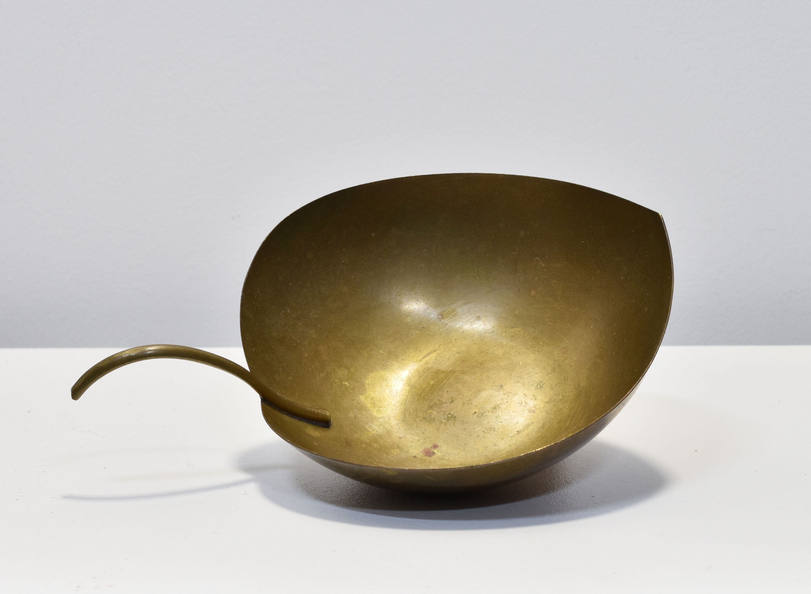 Empty brass leaf pocket