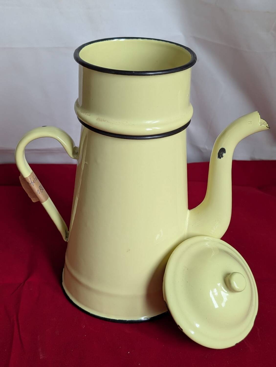 Yellow enameled metal coffee pot