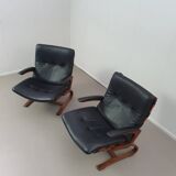 2 x leather lounge chairs