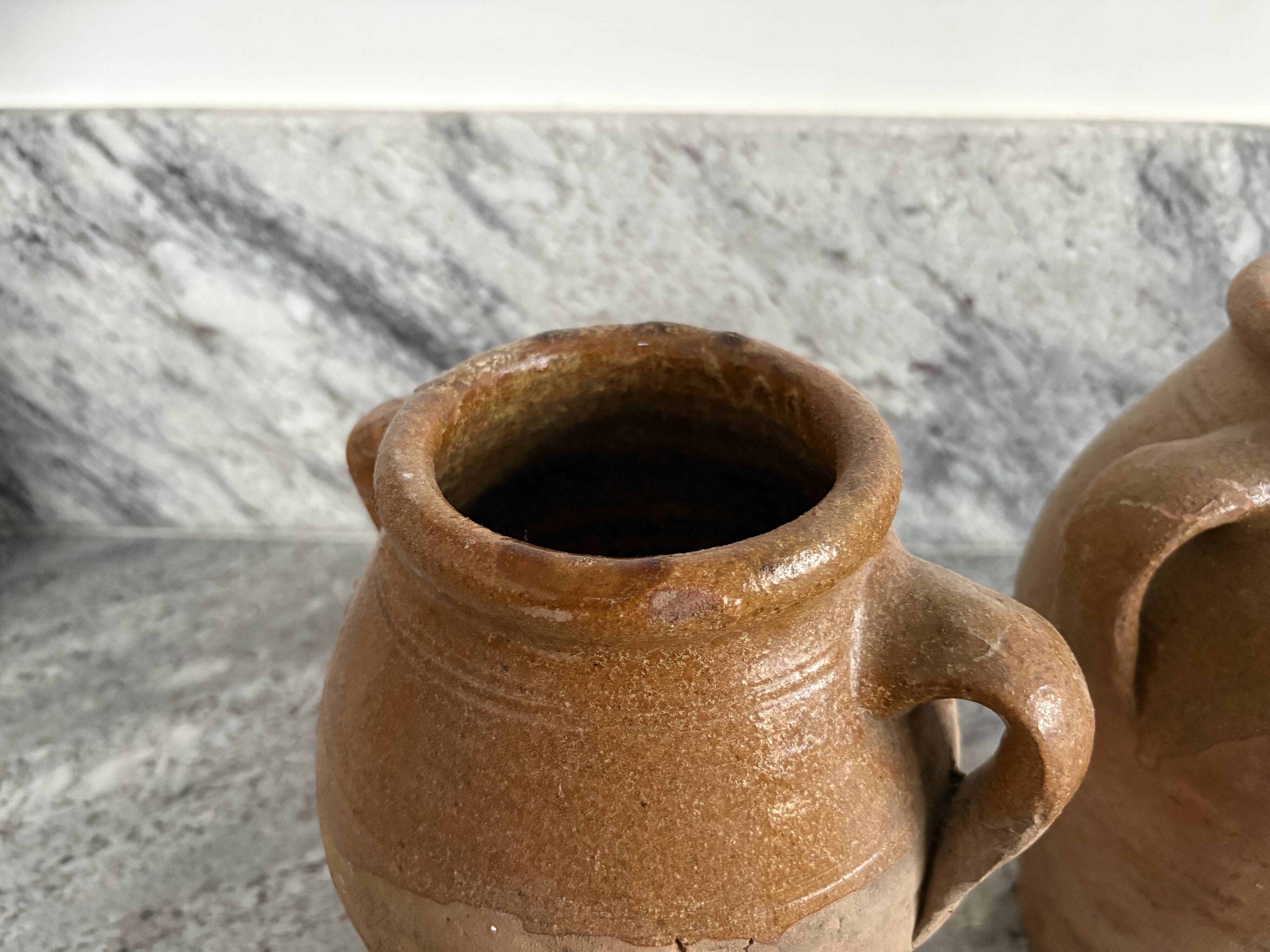 Pair of Provençal enamelled terracotta jars