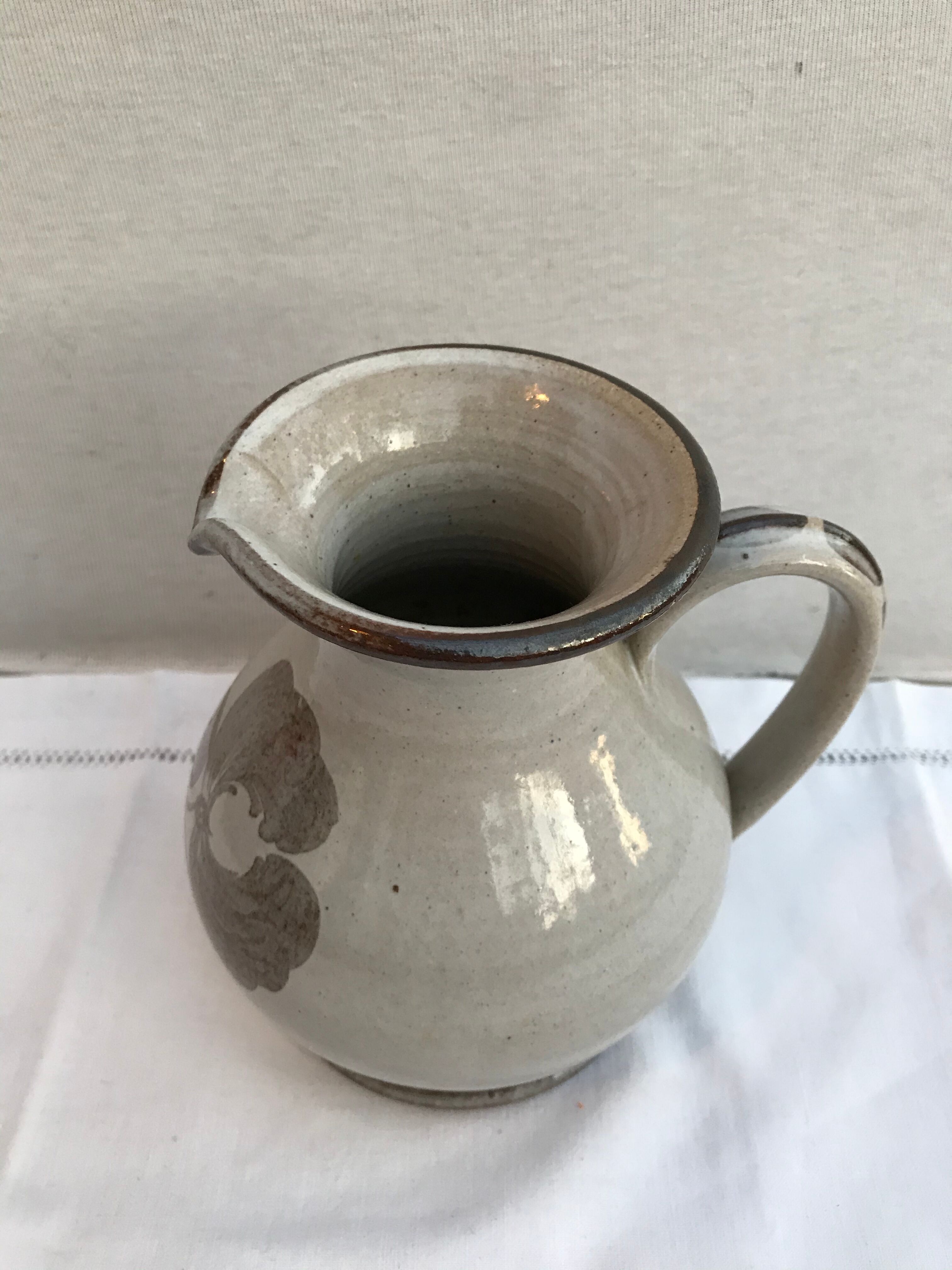 Former pitcher enamelled sandstone