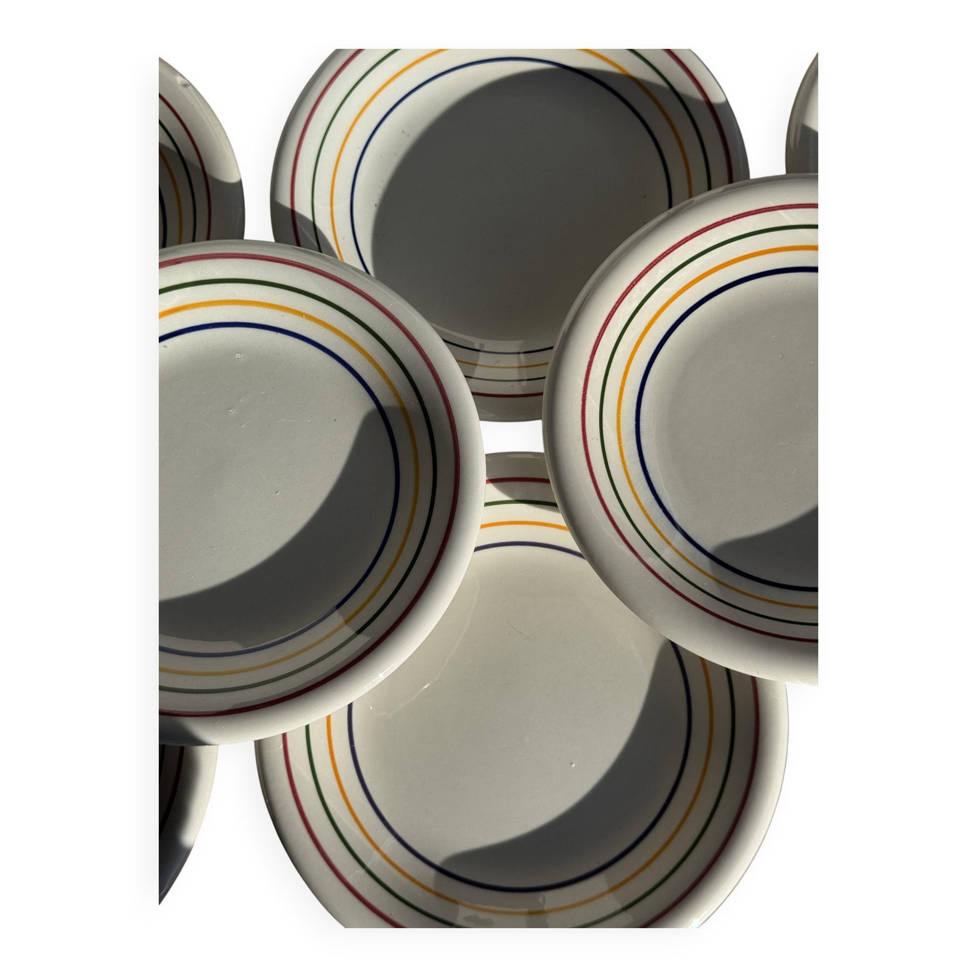 Set of 9 small Italian dessert plates Primula with red and green trim.