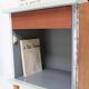 Bedside table with 1 door and 1 internal drawer.