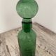 Old cracked glass carafe