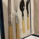 Ménagère de 26 couverts de table en inox et bakélite