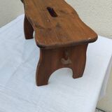 Old small vintage farm stool