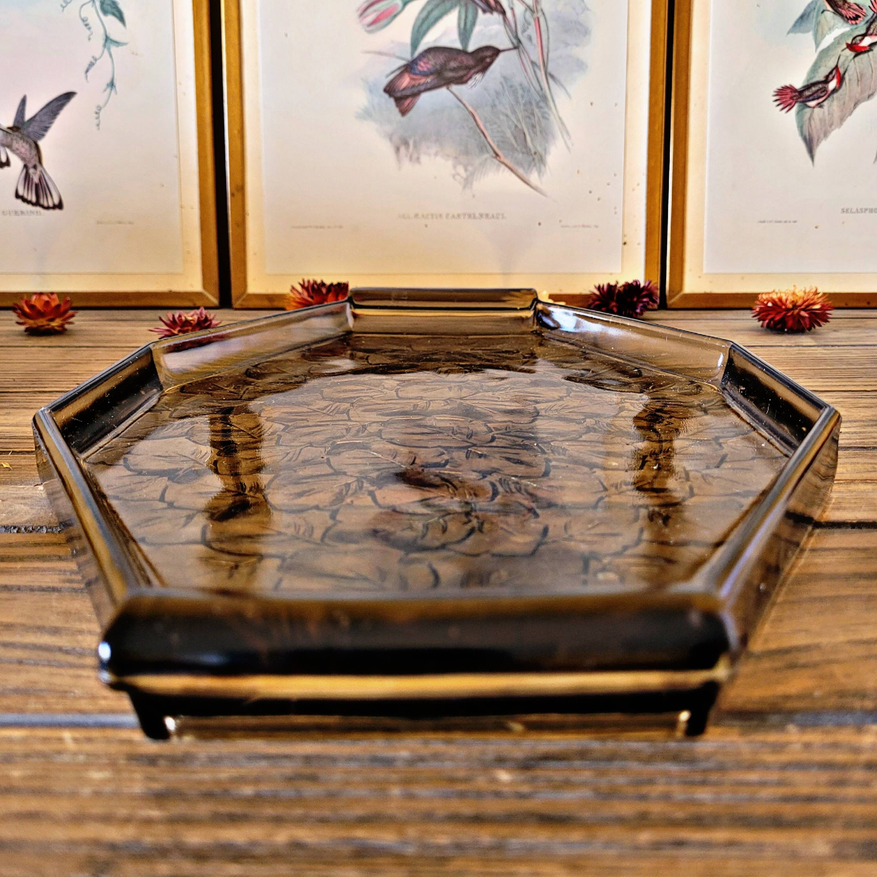 Art deco style black glass tray decorated with leaves