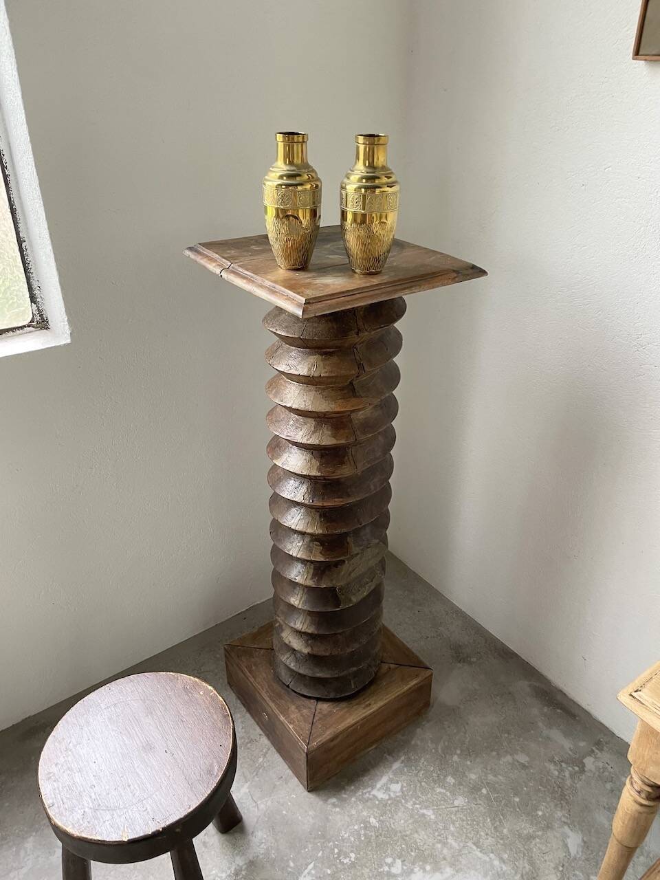 Duo of embossed brass vases