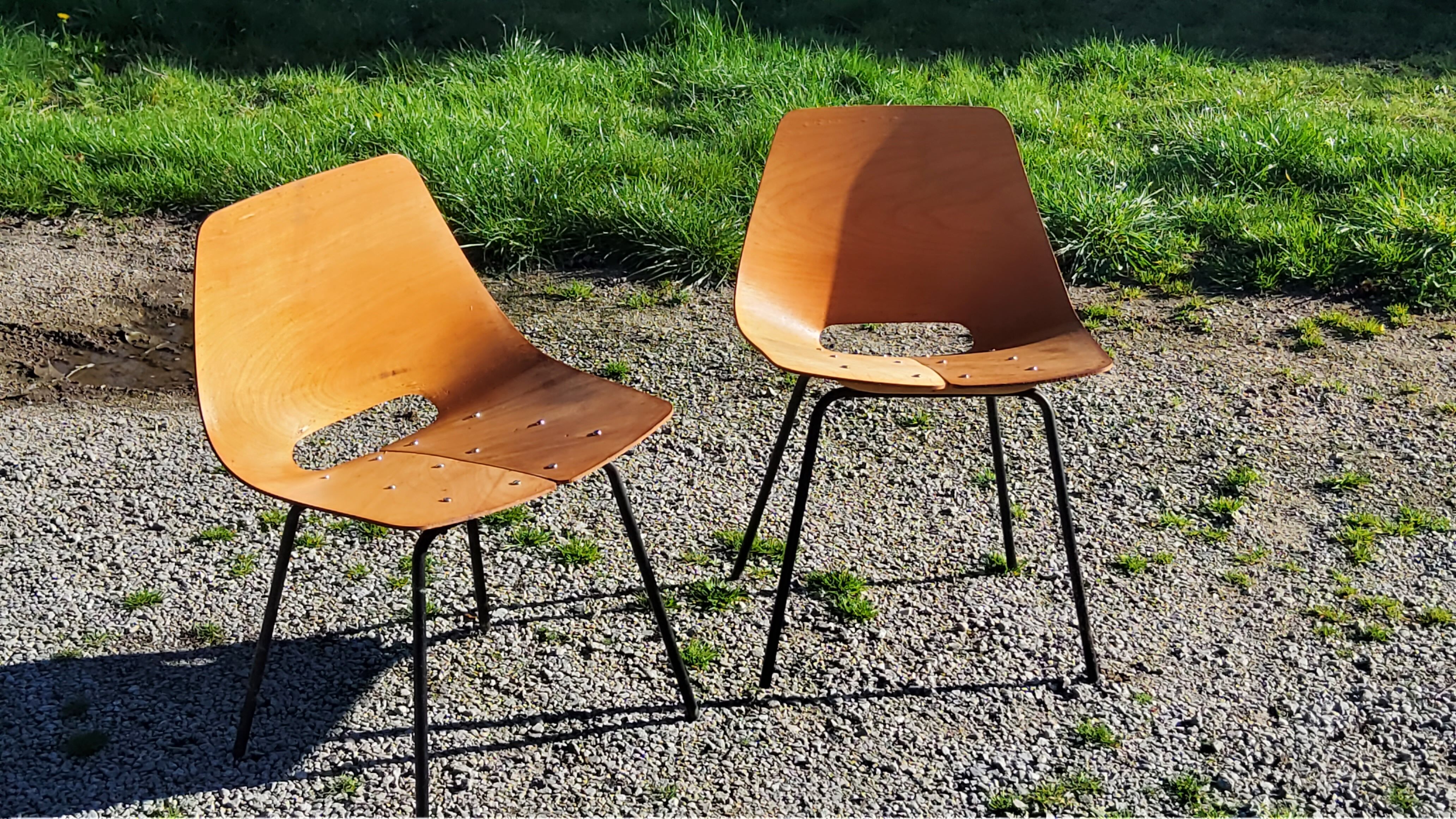 Pair of tonneau chairs by Pierre Guariche plywood base tubes 1954