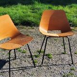 Pair of tonneau chairs by Pierre Guariche plywood base tubes 1954