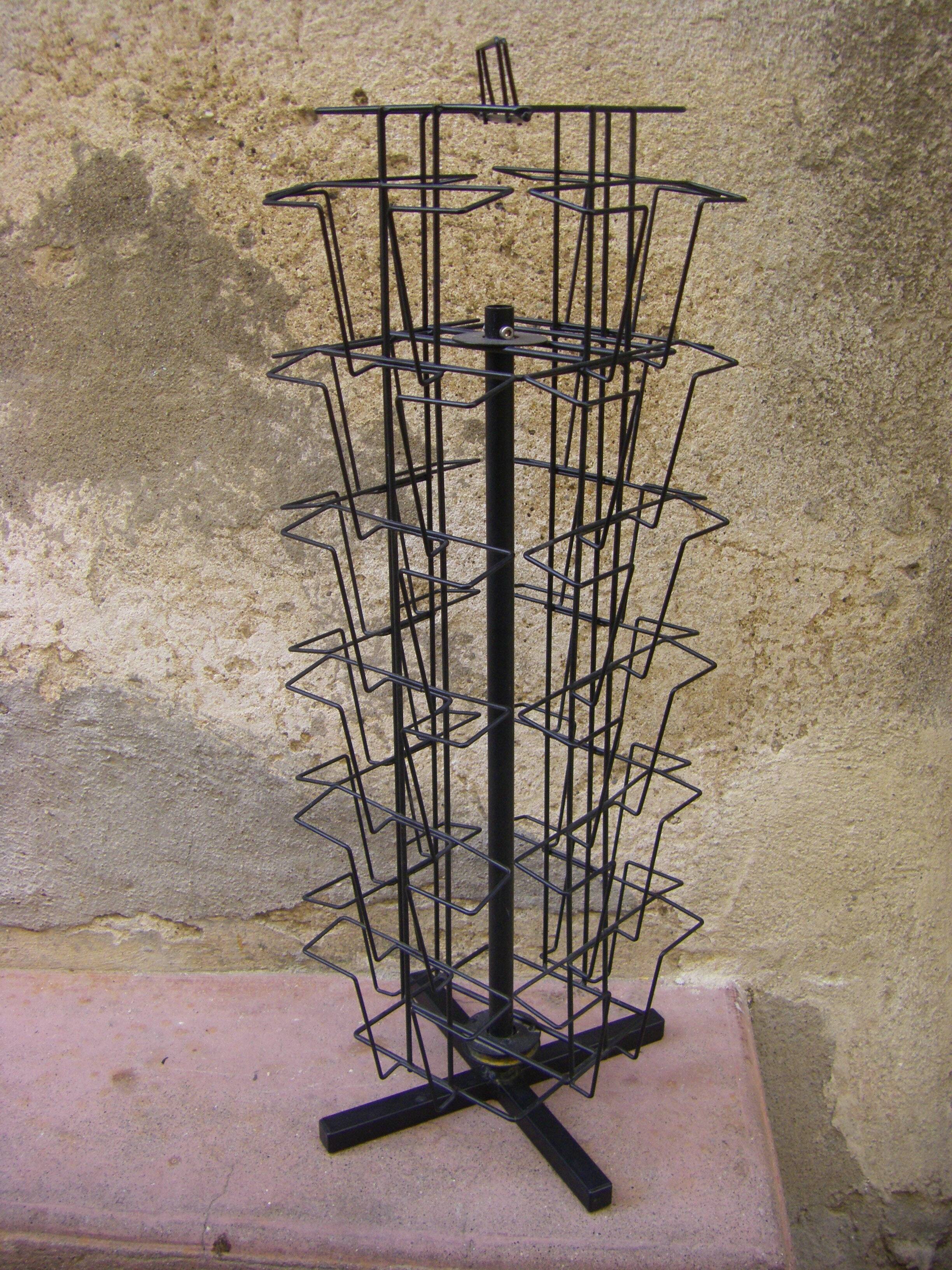 Black metal postcard turnstile display