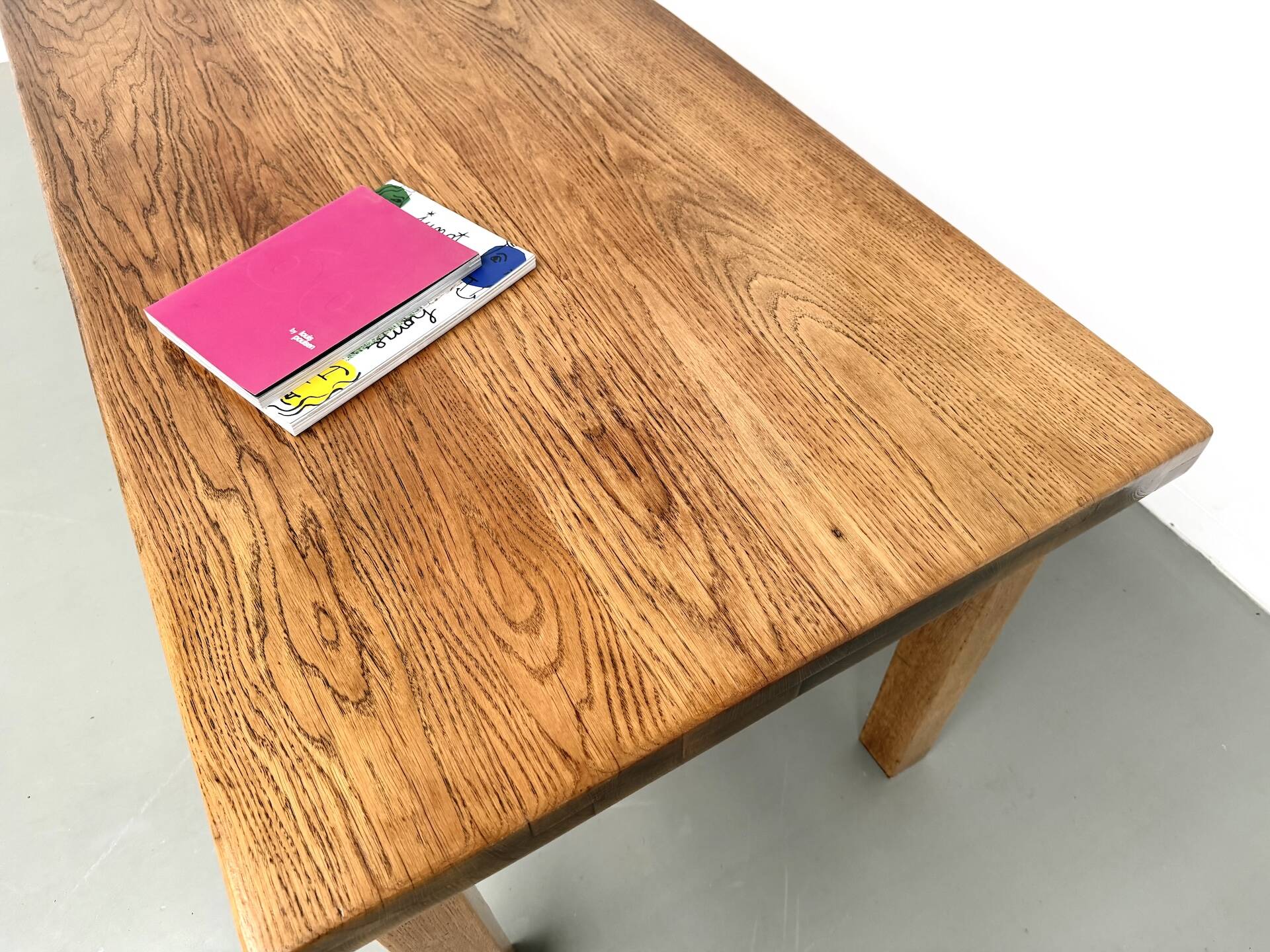 Solid oak farmhouse table, square legs.