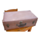 Green cardboard suitcase
