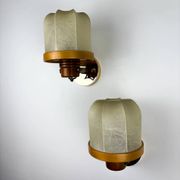 Pair of articulated "Cocoon" wall lights, resin and pine, Italy, circa 1970s